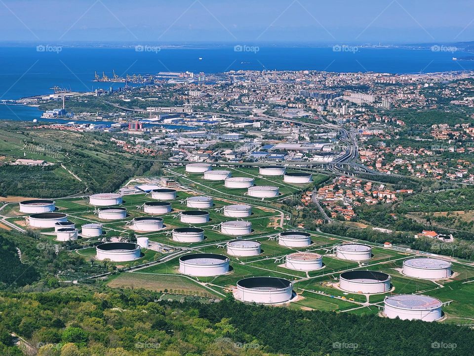 Scenic view of green hills against blue sky and Adriatic sea in Slovenia coast. Spring time