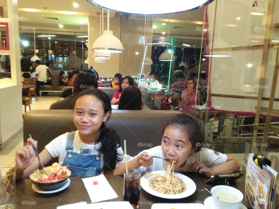 happy kids having dinner