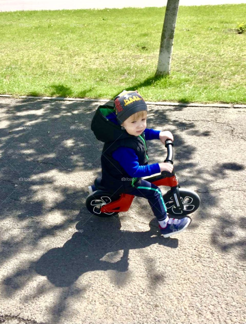 Little boy on a bicycle