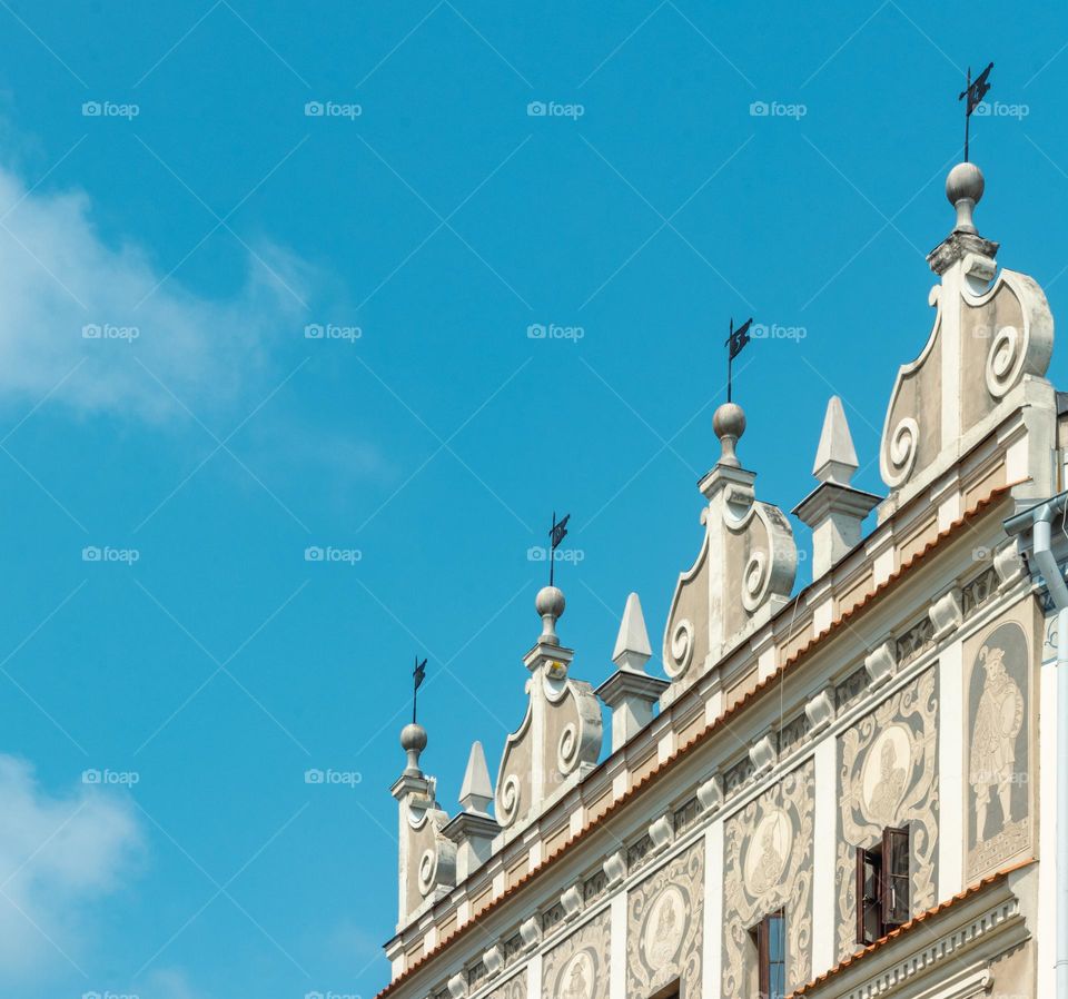 top of a beautifully decorated tenement house on the market square in lublin