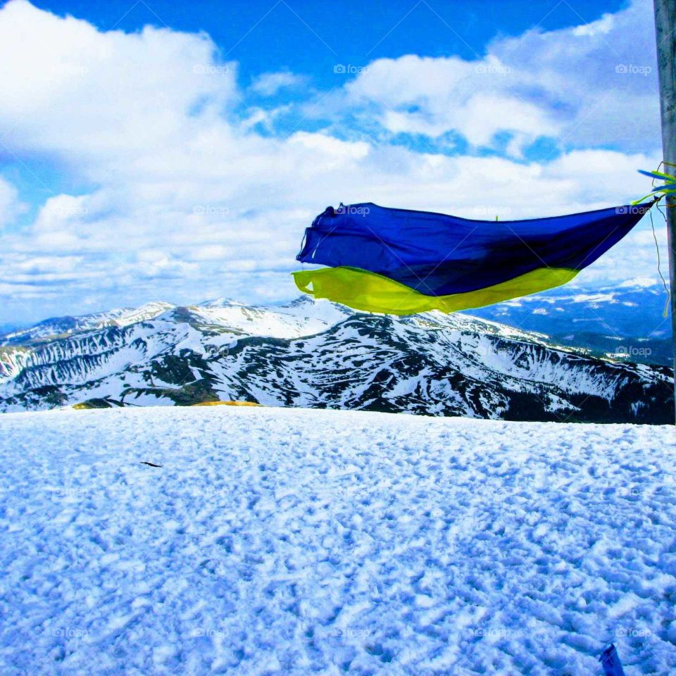 flag on top of the mountain