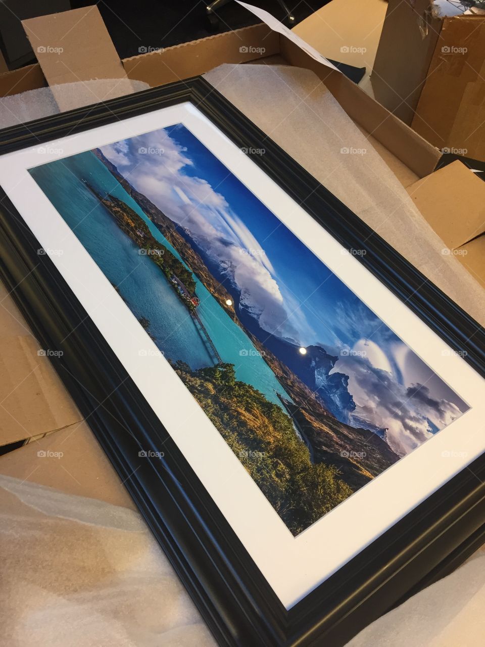 Opening up a Framed photo of Torres Del Paine