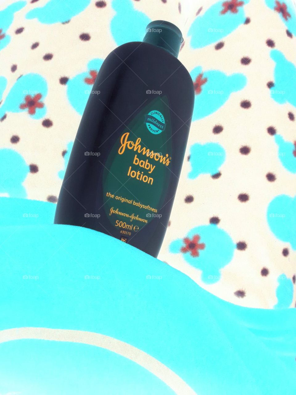 Johnson's baby lotion.. the magic portion to keep your baby's skin very nice 😉