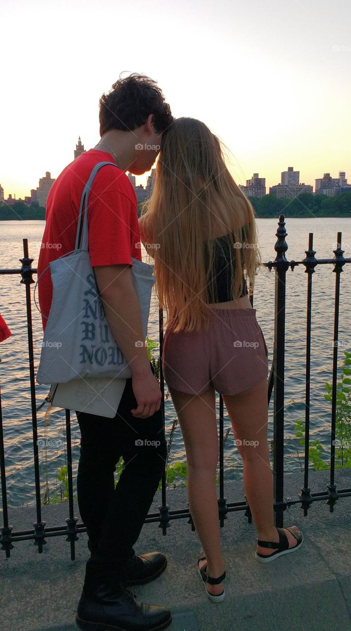 Young Couple Looking Over NYC Reservoir Summer