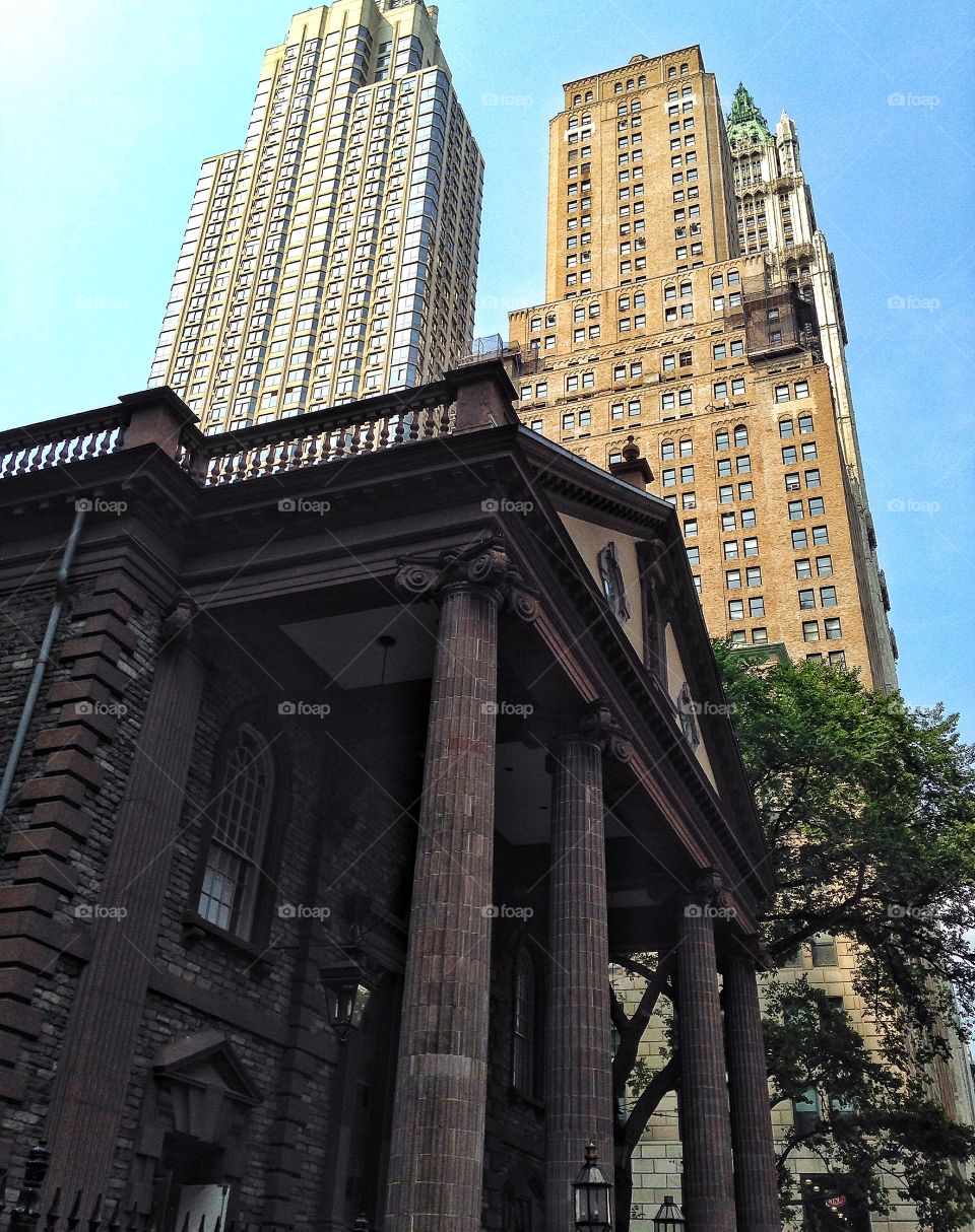 Financial District . Church backdropped by progress
