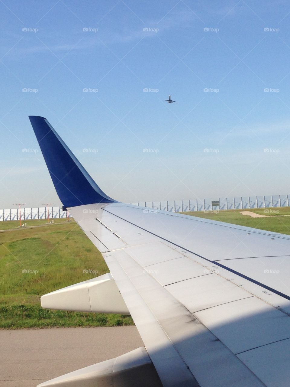 Wing man. Airplanes on runway 