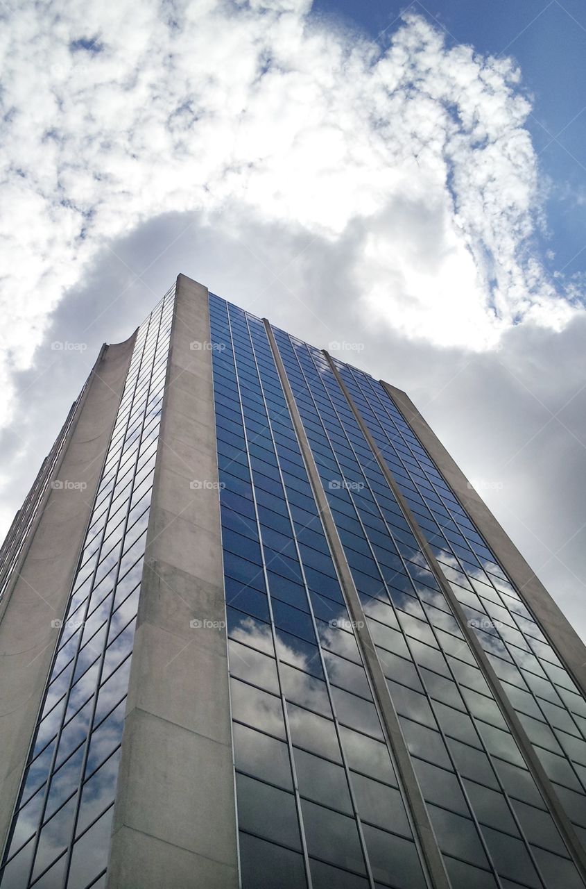 Cloudy sky skyscraper
