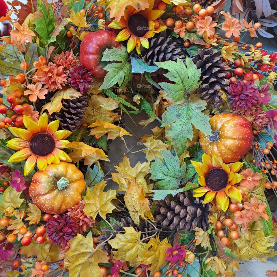 autumn colour wreath.pumpkin, sunflower, bright colour display