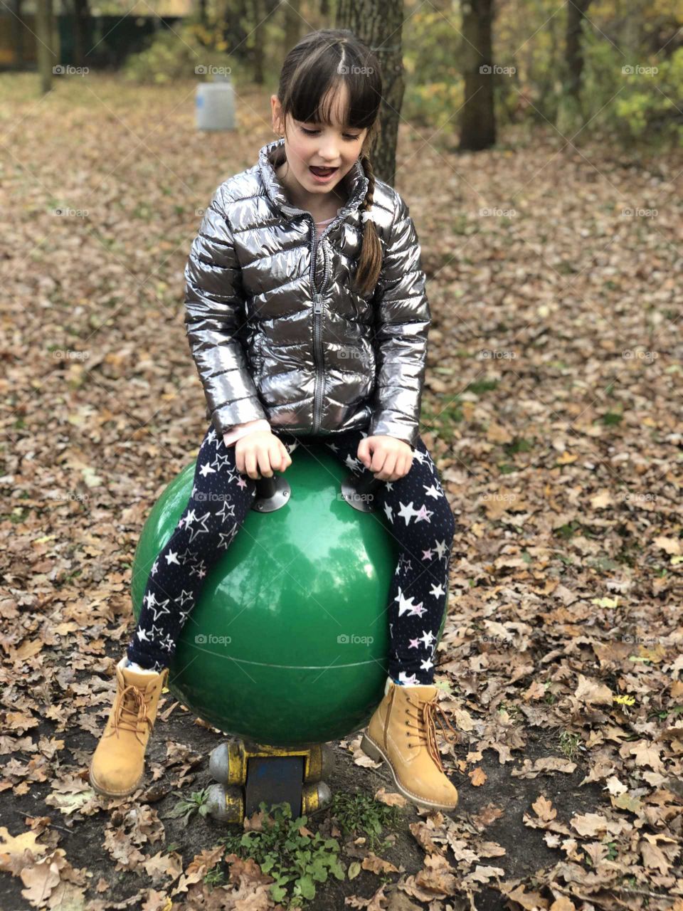 Sitting on a toy ball