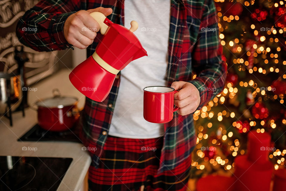 cup of coffee in a cozy festive Christmas atmosphere