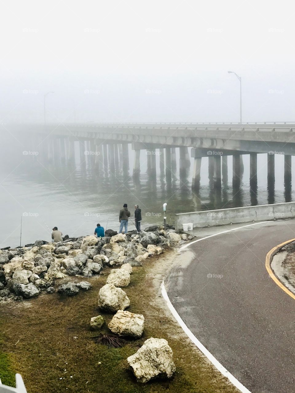 Foggy morning by the fishing pier