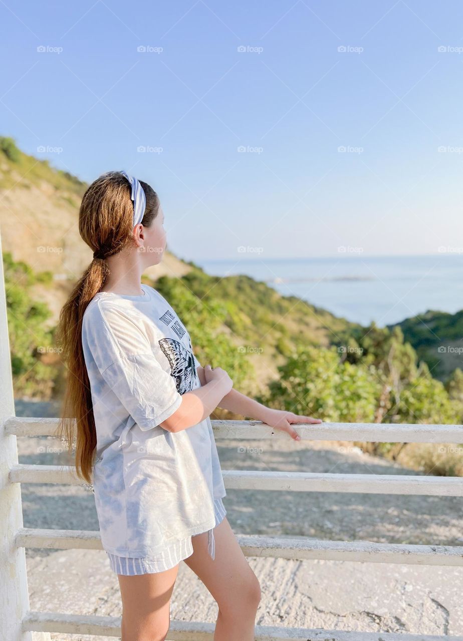 girl looking into the mountains