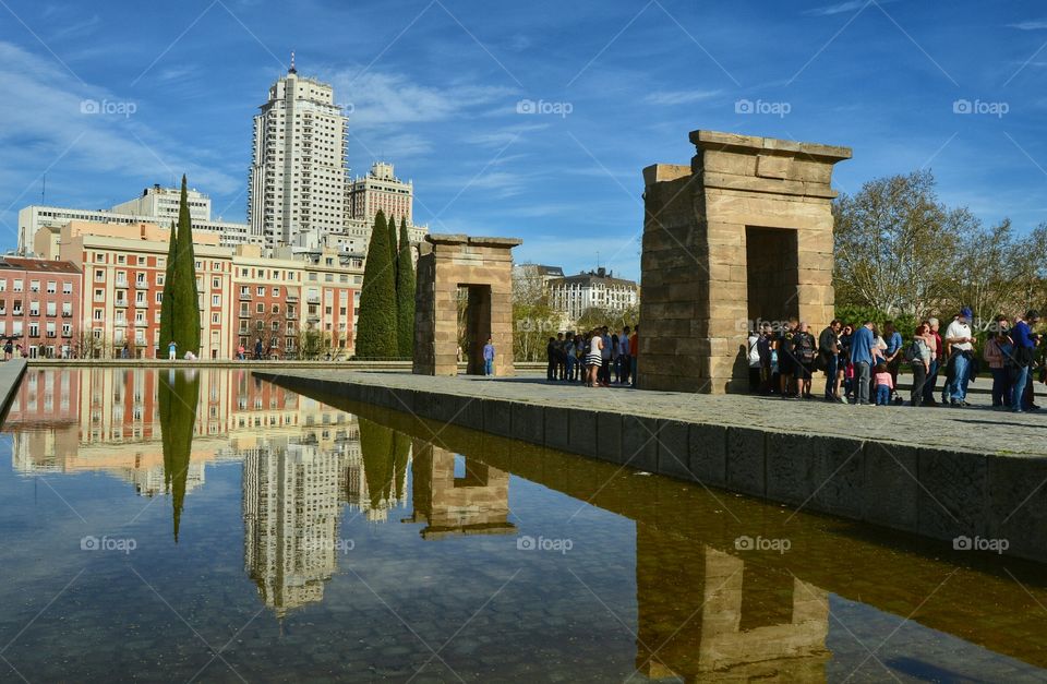 Modern vs Old. Contrast between Egyptian architecture at Temple of Debod and modern buildings at Plaza de España, Madrid