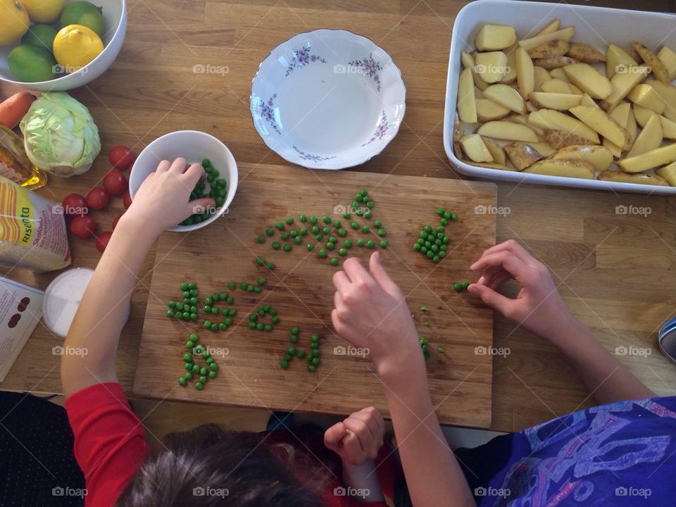 Cooking and playing with peas