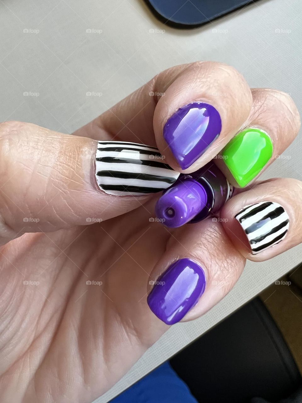 Beetlejuice inspired Halloween gel nail polish manicure 