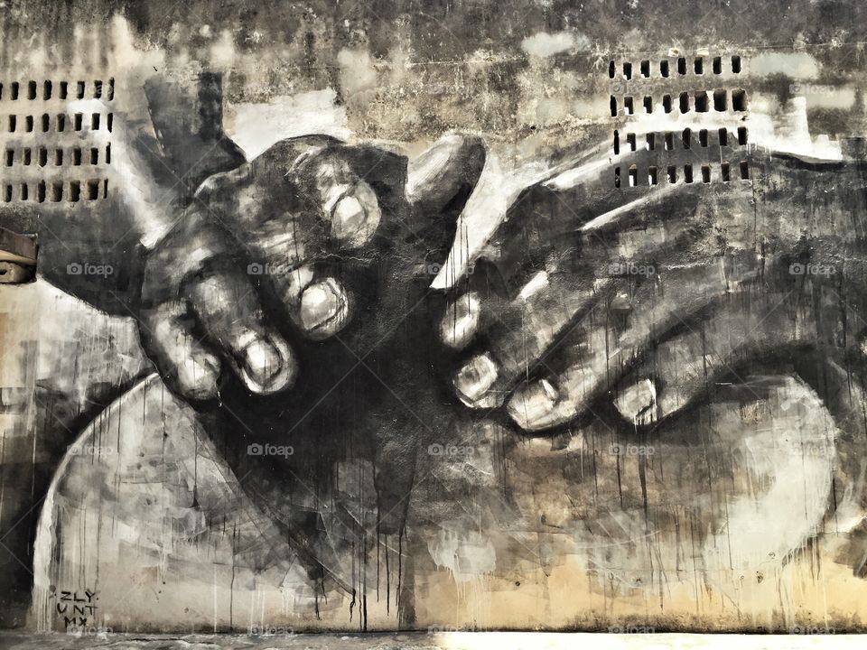 Cuban graffiti of hands playing bongo