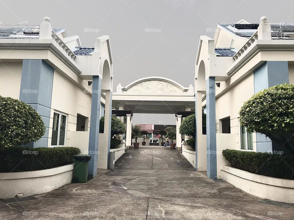 A group house entrance with arches 