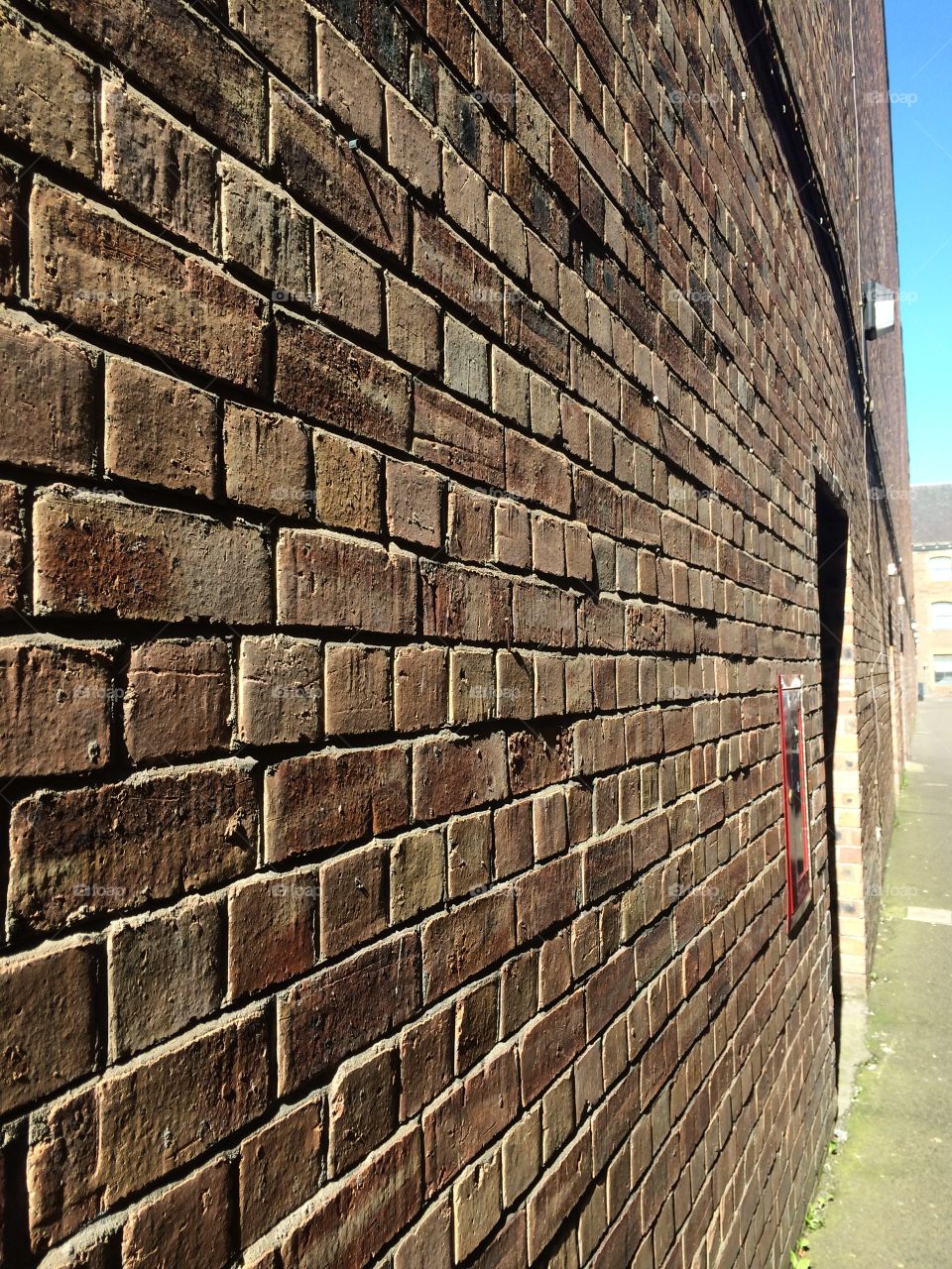 The Wall. Walking home, sun caught this brick wall in a really nice way. I didn't use any effects!