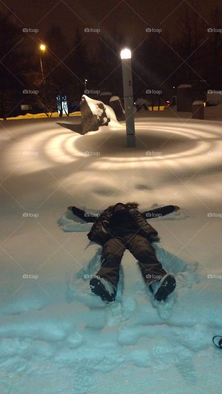 Making snow Angels in the winter time