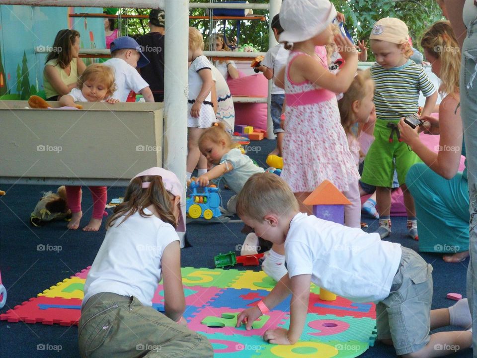 children play in the play area