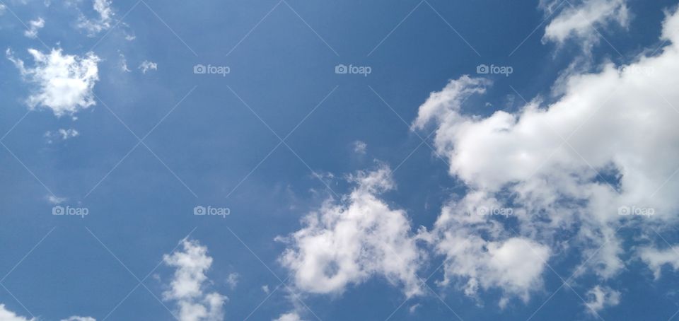 Strange clouds in the blue sky.