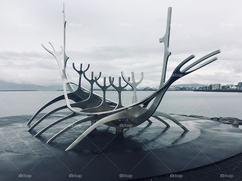 The metal art installation “the sun voyager” sits in the capital of Iceland overlooking the bay. 