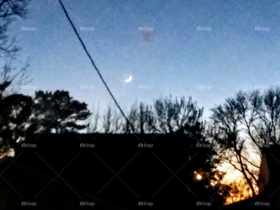 evening sky through a dirty window