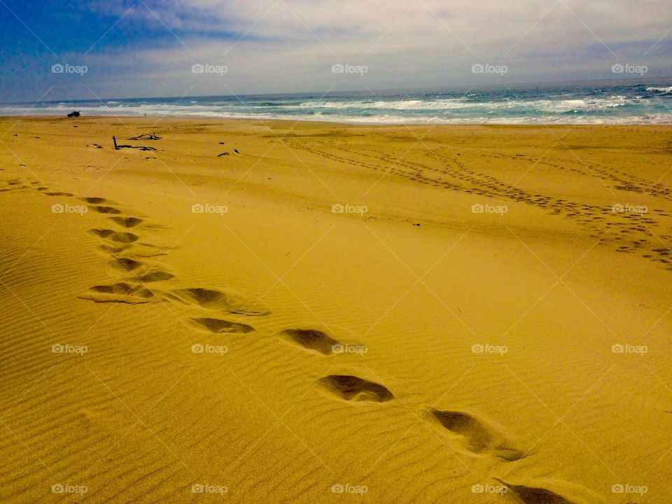 Human footprints on the sand