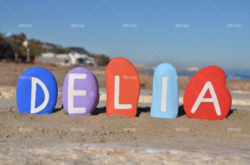Delia, female name on stones