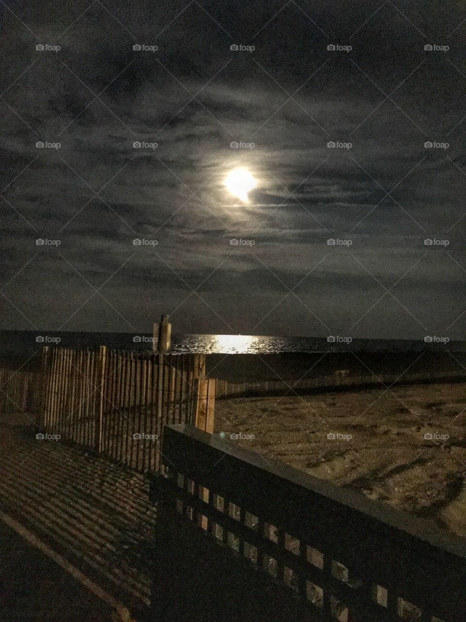 Rising moon over the ocean at Bethany Beach, Delaware 