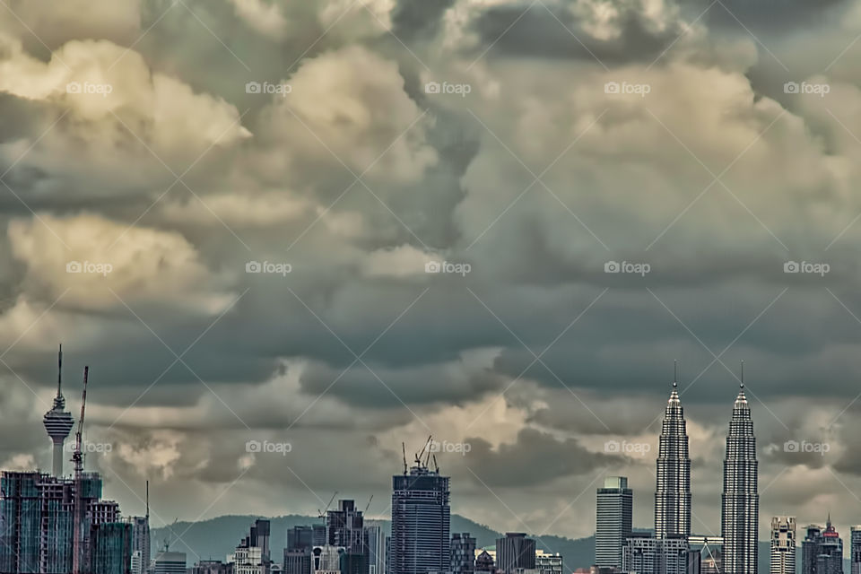 Storm clouds over city