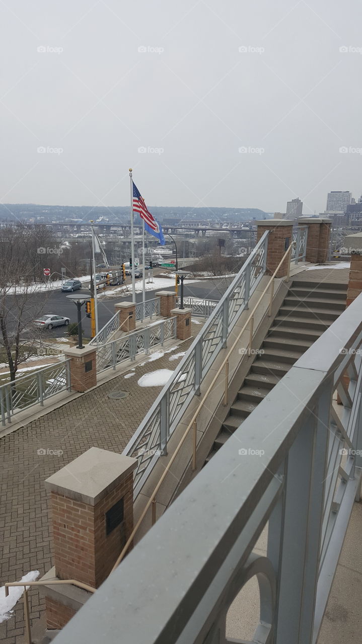 View of the flags and staircase at metro state University St Paul MN