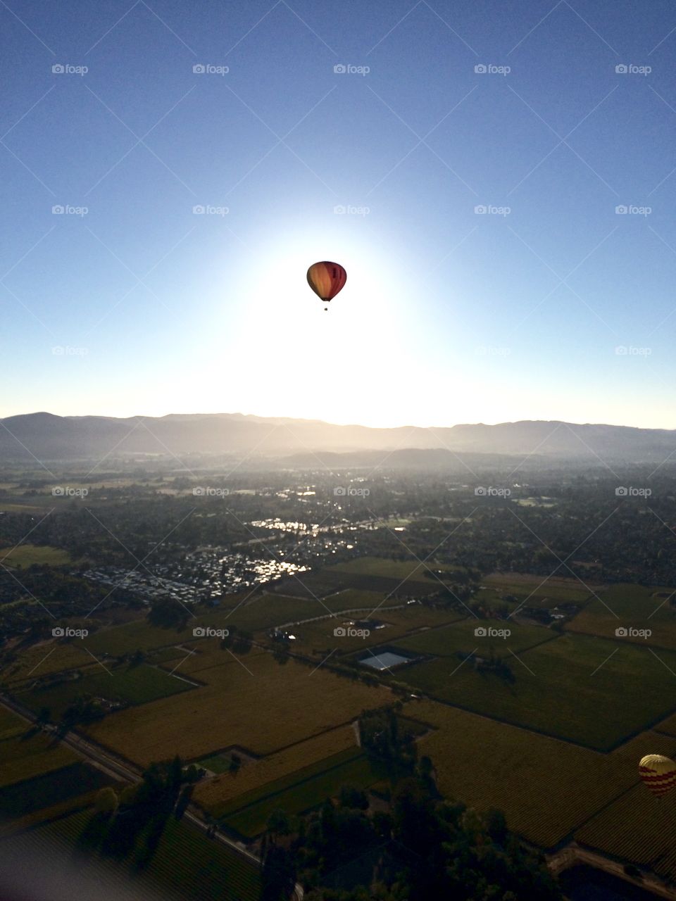 Hot air balloon by the sun 