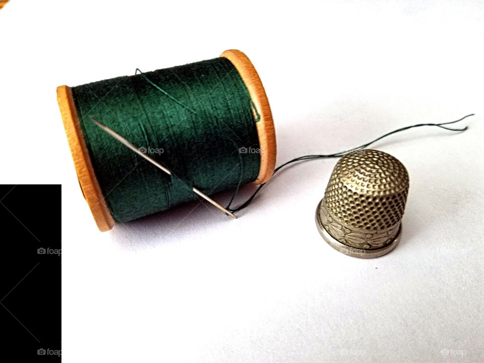 Needle, Thread & Thimble.   Symbols of the (almost) lost art of hand sewing!