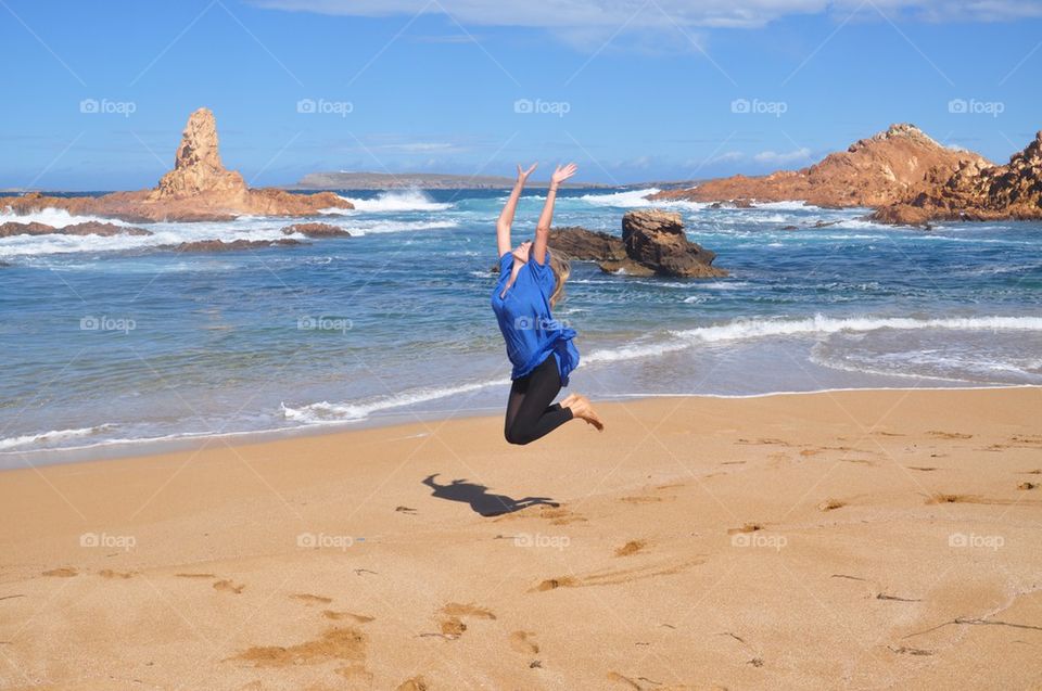 Beach jumping at Menorca island