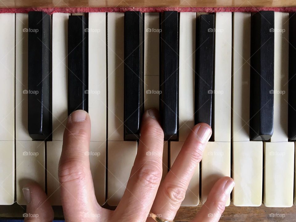 Fingers playing piano