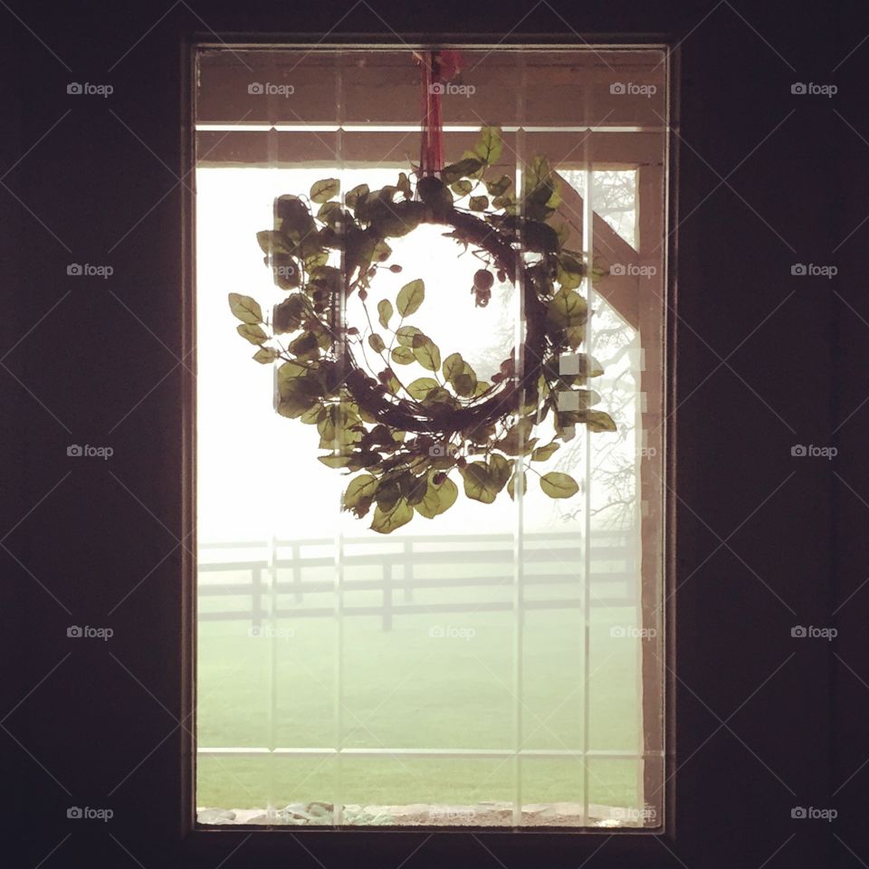 Wreath and wintry view. 