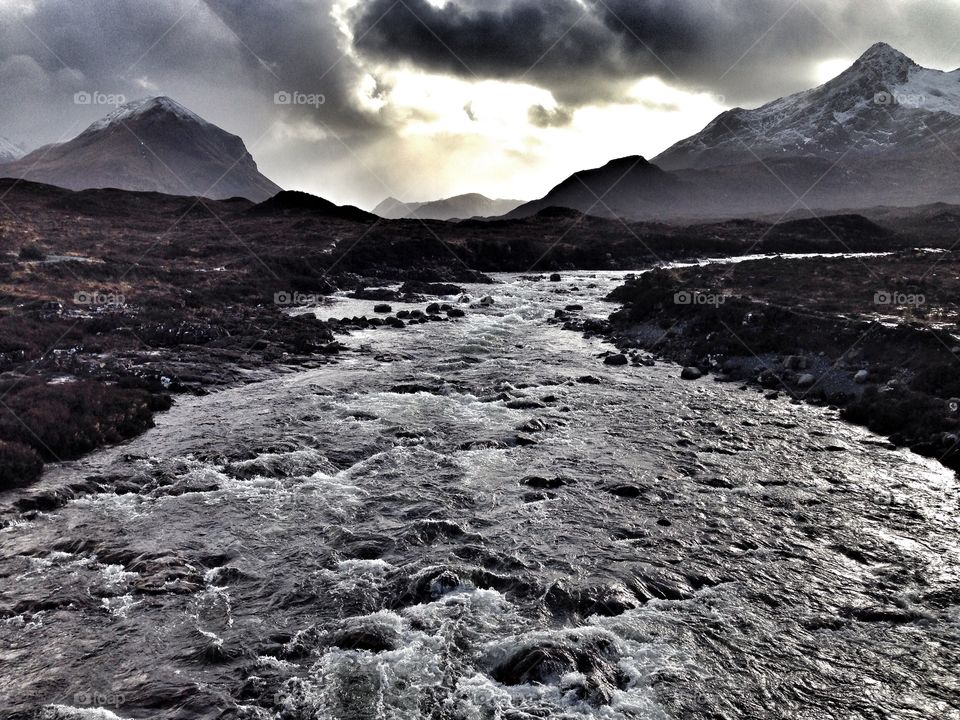 River on the Isle of Skye in the Scottish Highlands looking towards the Black Cuillins.