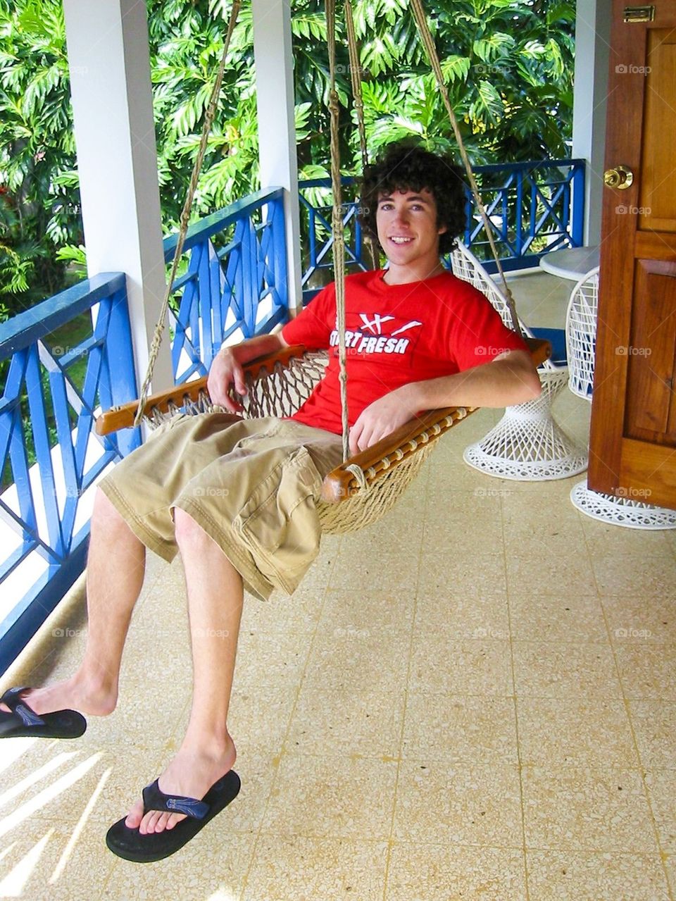 Man hanging out on the balcony