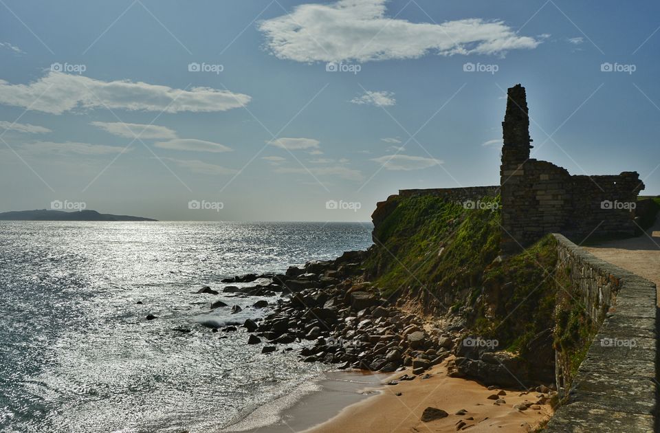 High angle view of cliff in sea