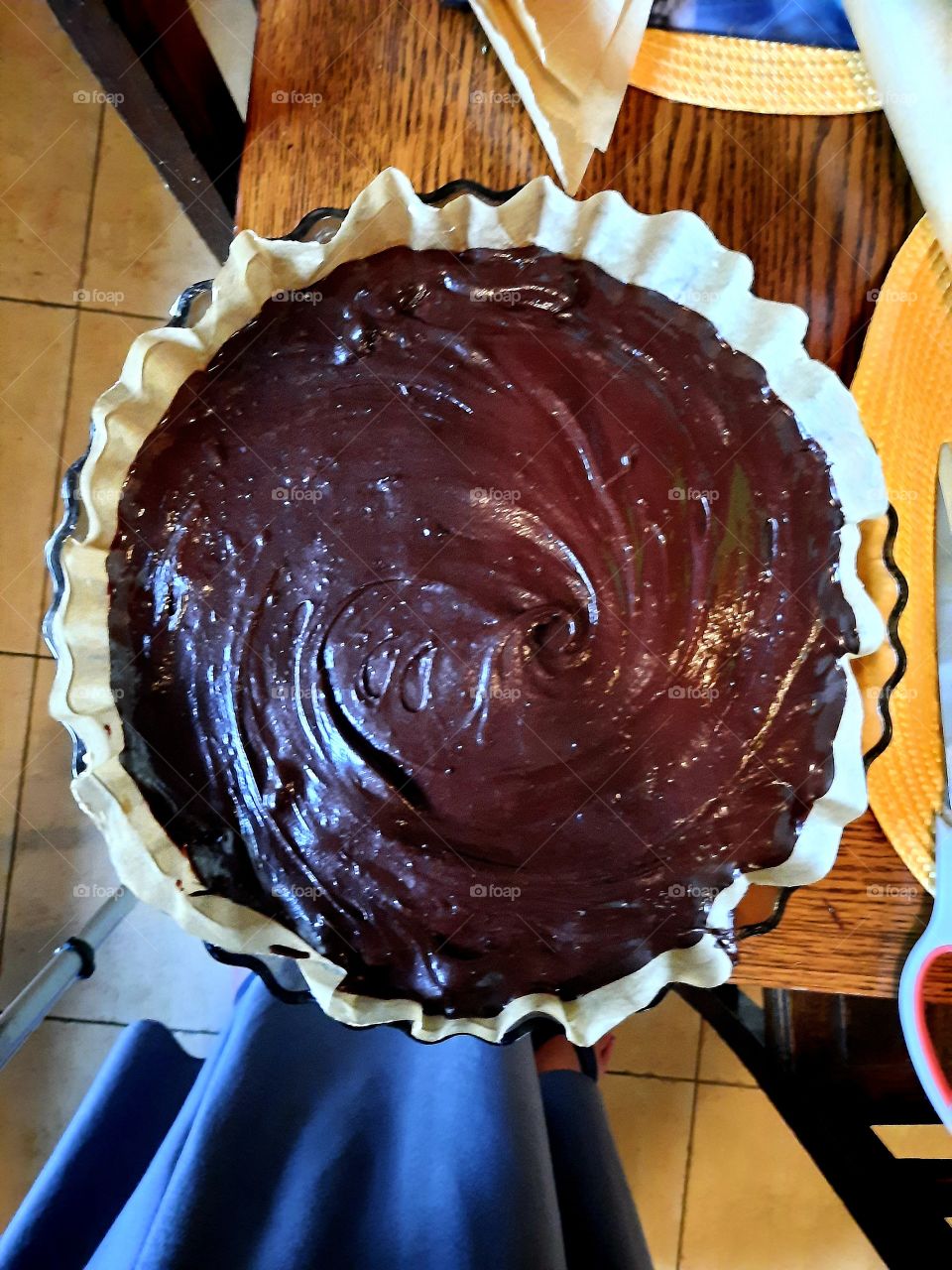 raw brownie dough in a baking form