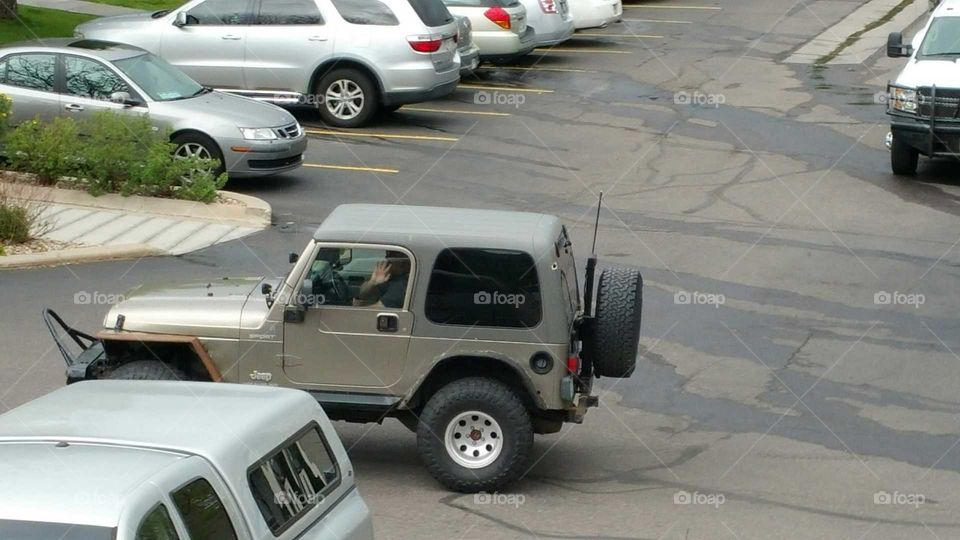 Baby going to work on his Jeep!