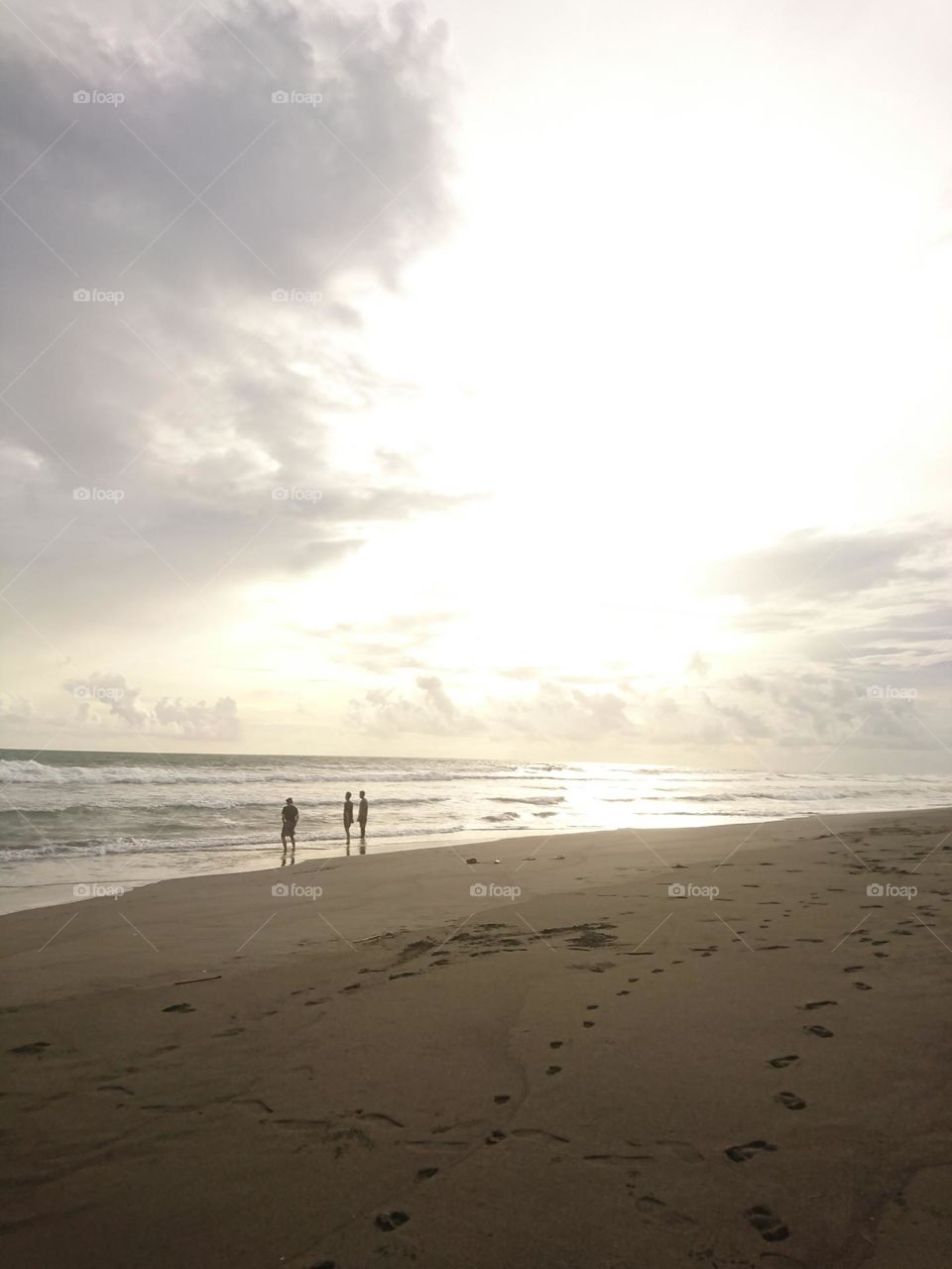 When the sun will set on the western horizon on beach