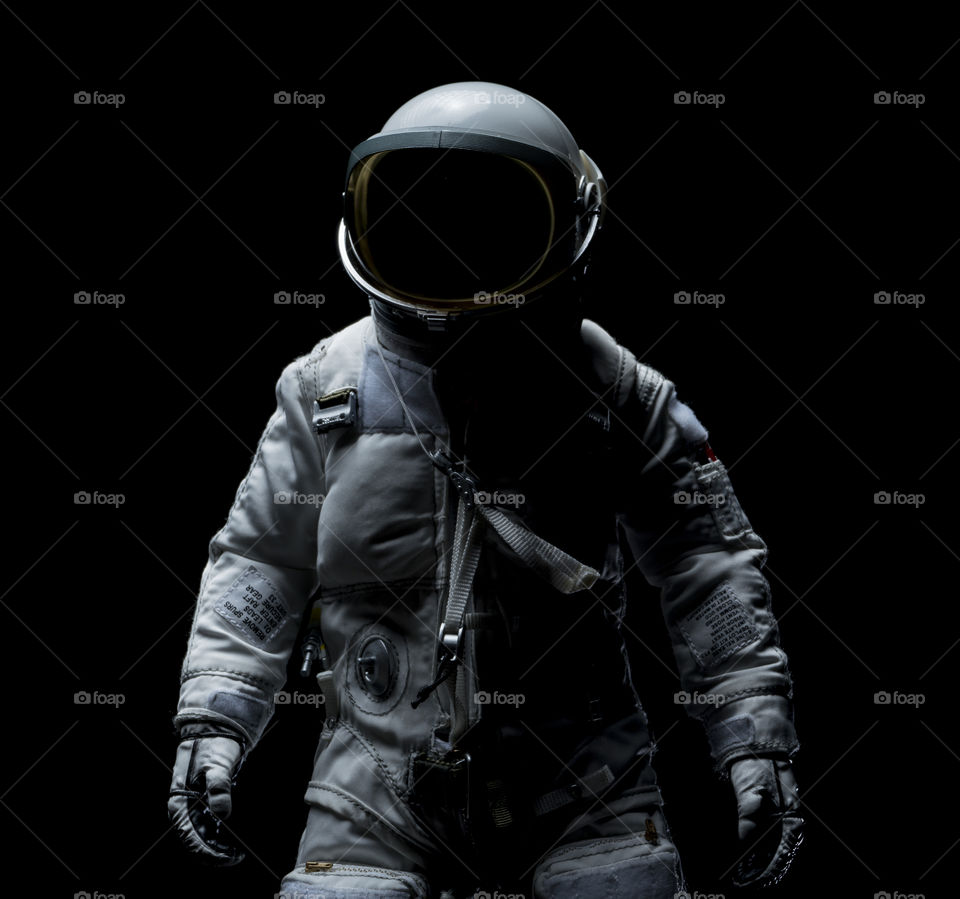 Astronaut with dark moody lighting