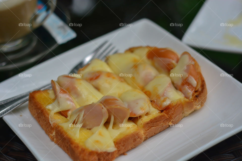 Bread with sausage and cheese