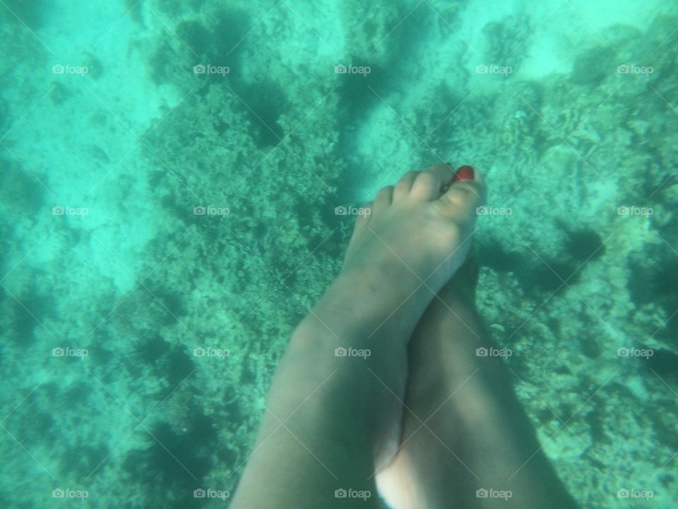 Feet underwater. My wife said, there goes my new painted nails.