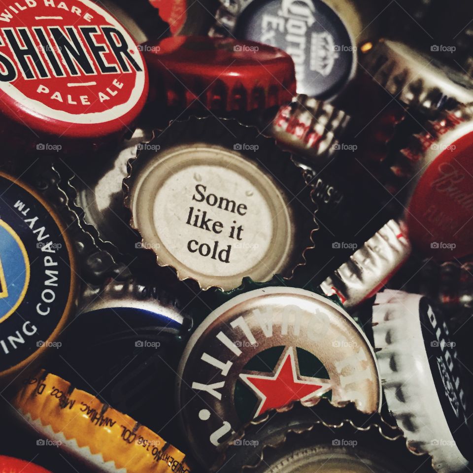 Some Like it Cold . Beer caps I have saved up for an art project 