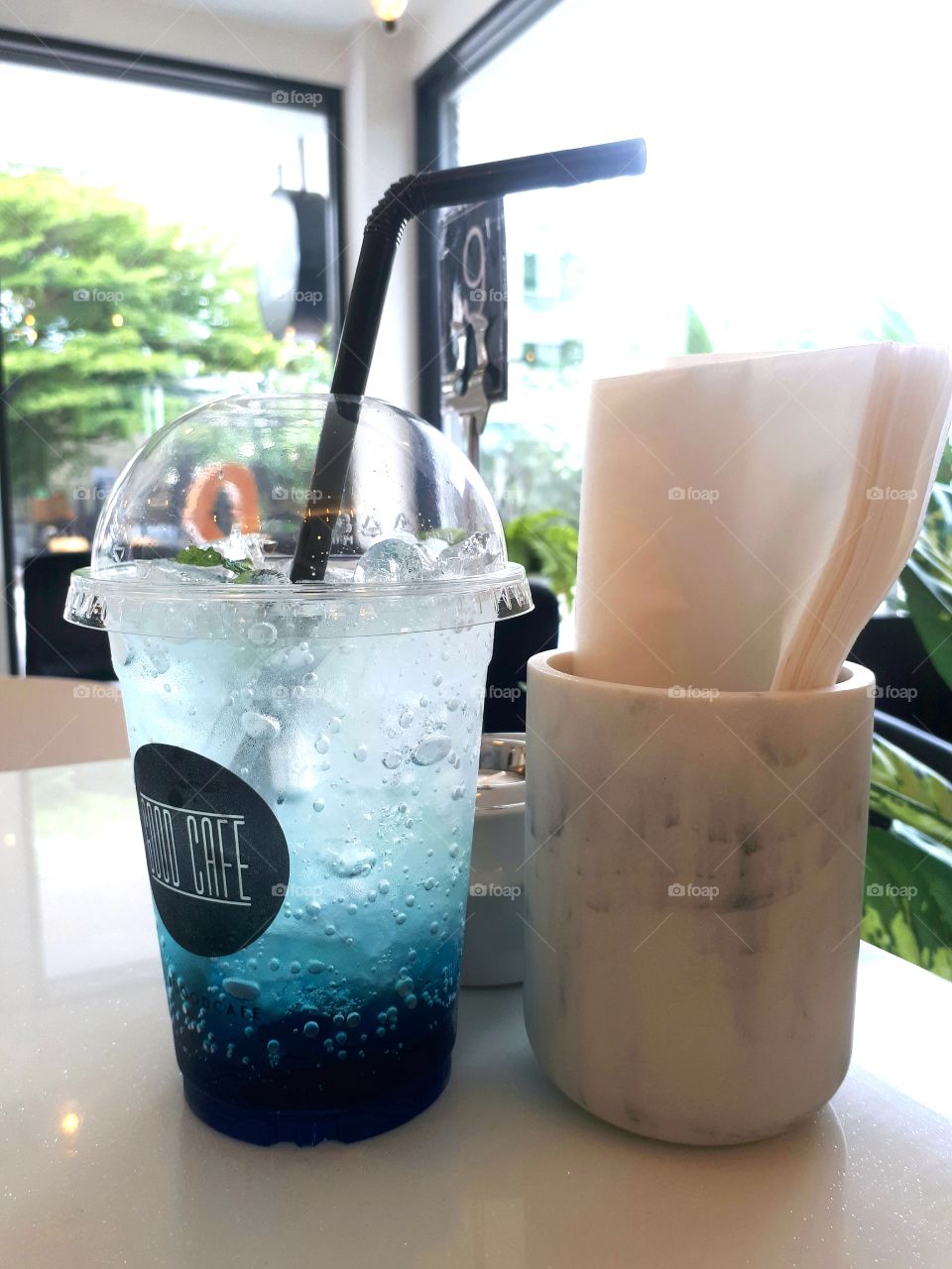 Blueberry soda with ice