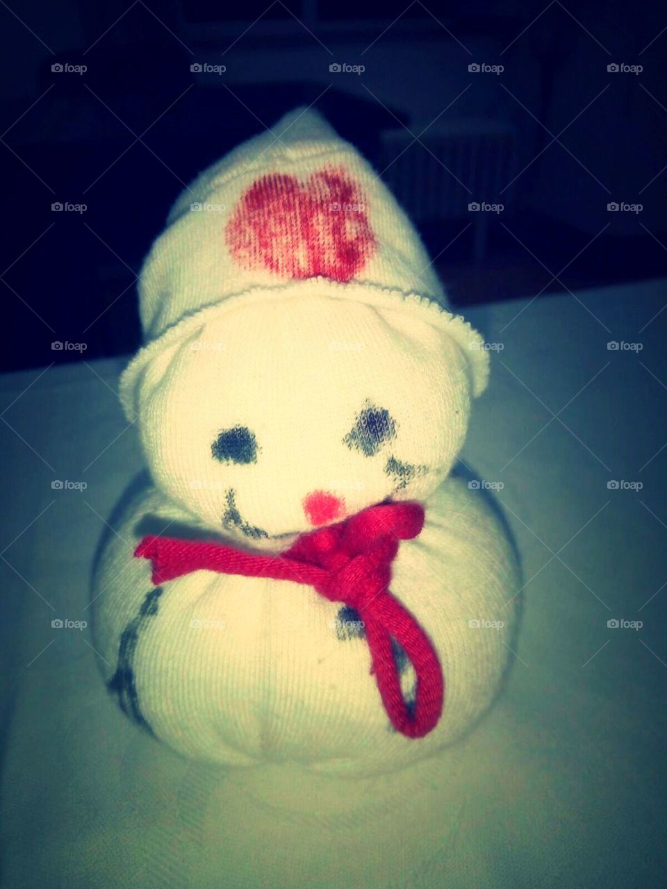 miniature snowman made from textile material