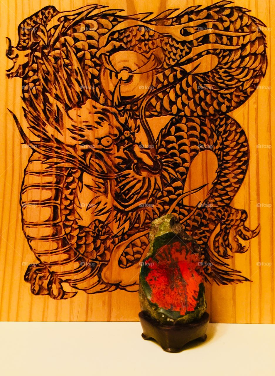 Japanese wood dragon wood carving and rock